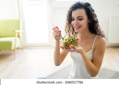 Fitness Woman Eating Healthy Food After Workout