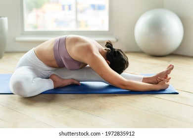 Fitness Woman In A Janu Sirsasana Pose