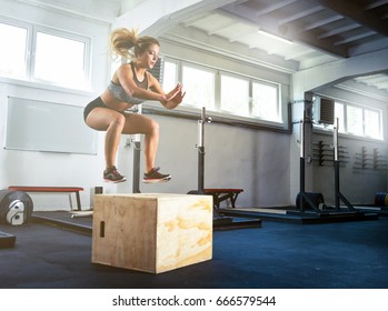 Fitness Woman Jumping On Box Training At The Gym, Cross Fit Exercise