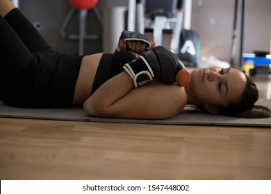 Fitness Woman Lying On Her Back After A Gym Workout - Shutterstock ID 1547448002