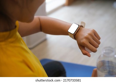 Fitness Woman Resting And Checking Heart Rate On Smartwatch. Concept Of Sport Technology To Checking Health Data.