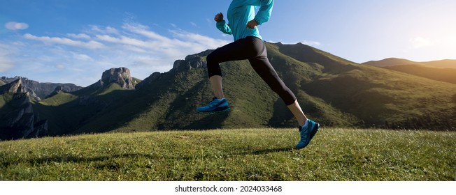 Fitness Woman Runner Running At Mountain Top