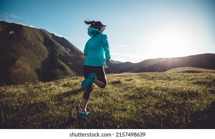 Fitness Woman Runner Running At Mountain Top