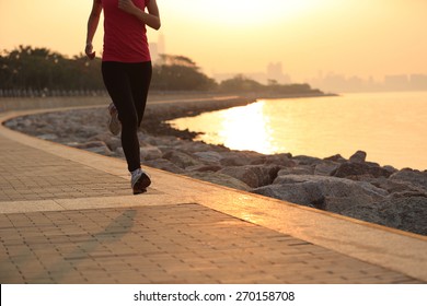 fitness woman running at seaside. woman fitness silhouette sunrise jogging workout wellness concept.  - Powered by Shutterstock