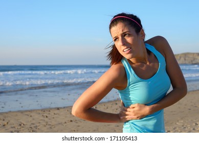 Fitness Woman With Side Kidney Pain. Female Athlete With Painful Injury Or Spasm In Serratus Muscles.