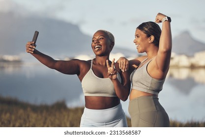 Fitness, woman taking selfie and workout in nature with plus size. Motivation or success, exercise or training and happy or cheerful female people winning photo with a cellphone outdoors together - Powered by Shutterstock