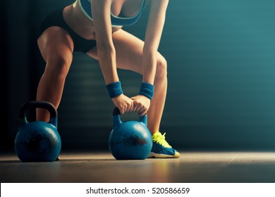 Fitness Woman Training By Kettlebell.