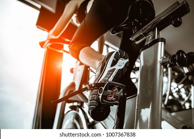 Fitness woman working out on exercise bike at the gym.exercising concept.fitness and healthy lifestyle  - Shutterstock ID 1007367838