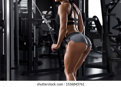 Fitness Woman Workout In Gym. Active Girl With Shaped Glutes. Beautiful Buttocks In Thong