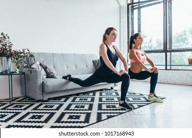 Fitness women doing front forward one leg step lunge exercises workout - Powered by Shutterstock