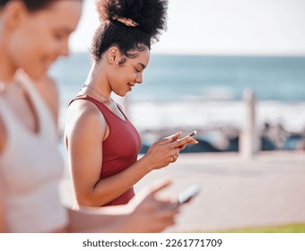 Fitness, women outdoor and smartphone for typing, break and resting with smile, training and wellness. Female athletes, girls and exercise with cellphone, happiness and workout for cardio and energy - Powered by Shutterstock