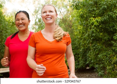 Fitness.  Women Walking And Exercising.