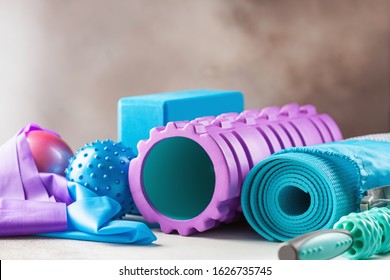 Fitness or yoga items - foam roller, block, mat, balls and roller massager