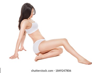 Fitness junge Frau mit schönem Körper auf weißem Hintergrund