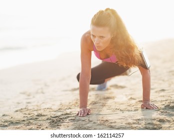 Fitness Young Woman Workout On Beach
