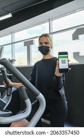 Fitness,sports.fit,Girl In Mask Fitness Gym  Opening Lockdown Covid Passport,QR Cod Wellness, Health Care,generation Z Sports Recreation Concept Online Fitness Apps. Workout,training,Fit Wellness