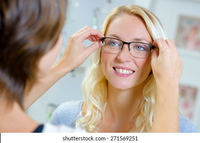 Fitting Glasses Onto A Lady