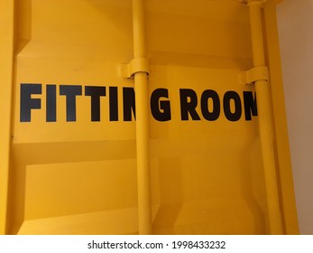 Fitting Room Sign In Clothing Shop Area.