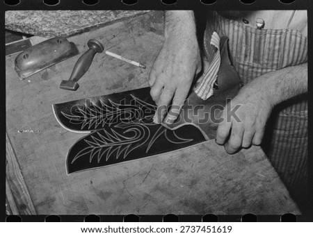 Fitting upper to lower part of boot. Bootmaking shop, Alpine, Texas by Russell Lee. Vintage photography by Russell Lee. Vintage America in photo by Russell Lee.