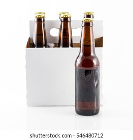 Five Bottles Of Beer In Cardboard Carrier