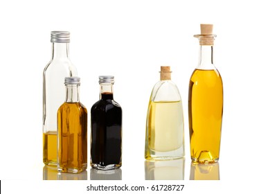 Five bottles of oil and vinegar in different outline and color - Powered by Shutterstock