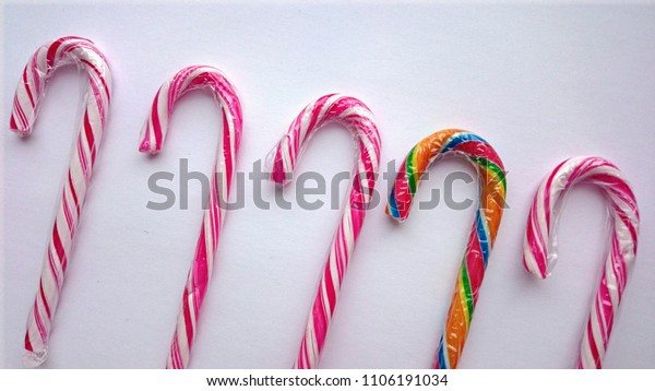 Five Candy Canes One Rainbowcolored On Stock Photo 1106191034 ...