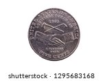 Five Cents Coin On White Background United States Louisiana Purchase Handshake Peace Pipe And Tomahawk 