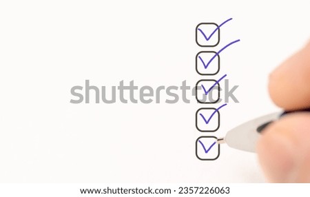 five checkboxes. marking on checklist box. hand with pen writing check mark on Checklist. Completed tasks are ticked off on to do list. businessman checking mark on checklist with ballpoint