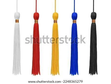 Five different color tassels isolated on white background
