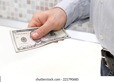 Five Dollar Bills In Man Hand