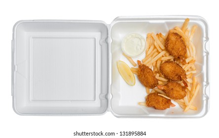 Five Fried Shrimp, Some French Fries, A Lemon Wedge And Tartar Sauce In An Open Takeout Box From A Fast Food Restaurant. Isolated On A Pure White Background. Photographed From Directly Above.