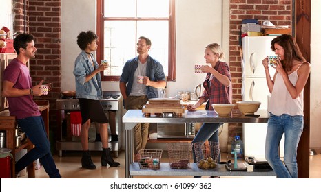 Five Friends Stand Hanging Out In Kitchen, Quarter Length