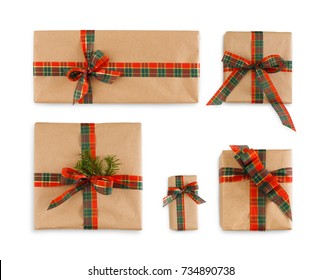 Five gift boxes wrapped in craft brown paper and checkered ribbon, isolated on white background. Modern present for any holiday, christmas, valentine or birthday - Powered by Shutterstock