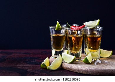  Five Glasses Of Alcohol And Lime And Red Chili, A Party At The Bar, A Menu For The Bar. Tequila Shots, Vodka,whisky, Rum. Selective Focus And Copy Space