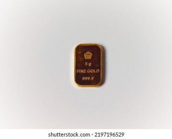 Five Gram Gold Bar On White Background.