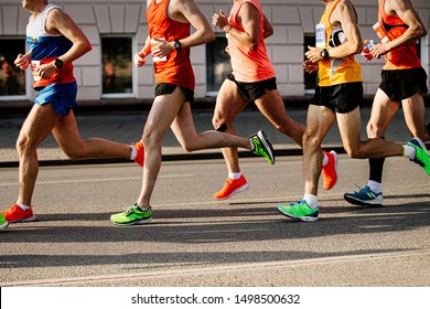 Five Men Runners To Run City Marathon Side View