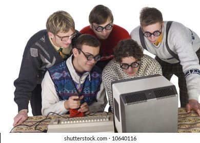 Five Nerdy Guys Playing On Old-fashioned Computer. They Are Enjoying It. Front View, White Background