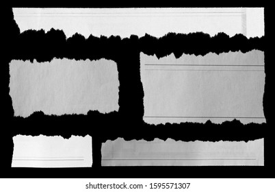 Five Pieces Of Torn Newspaper On Black Background