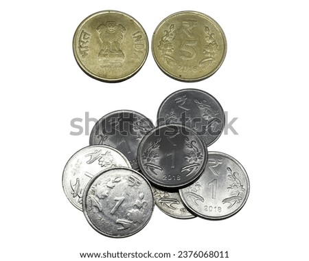 five rupees coin, and one rupees coins. on white background. Rupees, Indian Currency coins money, business real estate concept.
