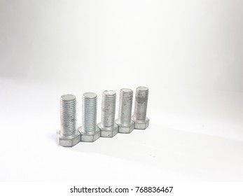 five screws silver background