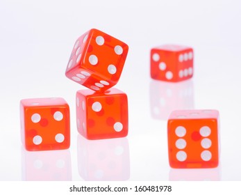 Five separate red playing dices isolated over white background
