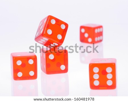 Five separate red playing dices isolated over white background