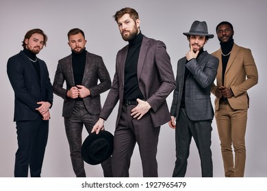 Five Serious Gangsters Stand In A Row In Studio. Retro. Indoors. Young Guys In Elegant Fashionable Fancy Suit Or Tuxedo Posing At Camera, Copy Space