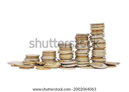 Five stacks and pile of scattered different coins coins isolate on white background. Money growth concept.