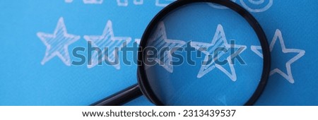 Five stars feedback rate us on blue background with magnifier