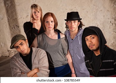 Five stylish hip hop dancers posing in urban setting - Powered by Shutterstock