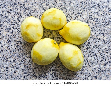 five thin peeled lemons