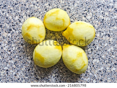 five thin peeled lemons