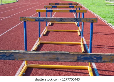 Five yellow and blue athletic obstacles close to each other - Shutterstock ID 1177700443