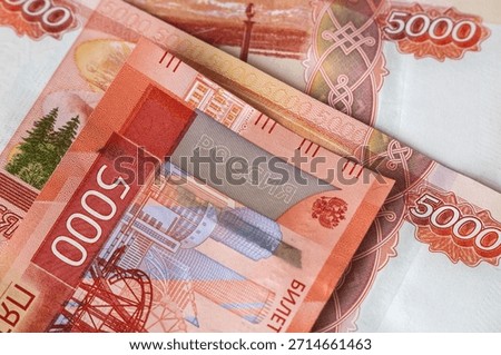 Five-thousand ruble banknotes of different issues